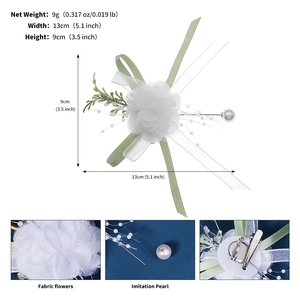 Detailed view of white fabric bridal flower with pearls and ribbon, measuring 13x9cm