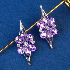 Elegant silver hair clips with purple crystal flower design and sparkling zircon accents