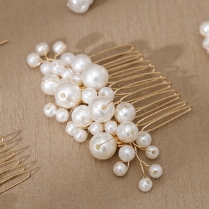 Handmade gold bridal hair comb set with white pearls for elegant wedding hairstyles
