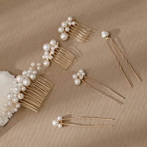 Detail of 6pcs gold pearl hair combs and pins set for wedding hairstyles on lace