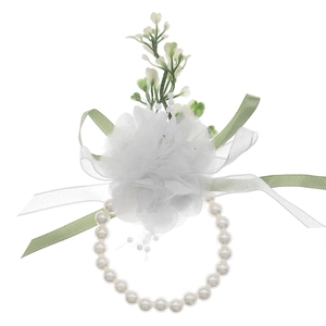 Elegant white tulle wrist corsage with green ribbons and pearl bracelet for weddings