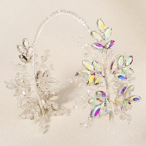 Close-up of hand-woven silver bridal headband with sparkling rhinestones and crystal beads