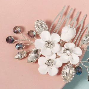 Handmade bridal hair comb with white ceramic flowers, crystals, and silver rhinestones