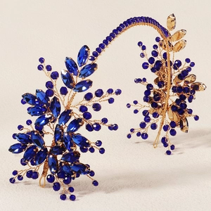 Exquisite bridal headband with deep blue crystals and gold wire botanical weaving