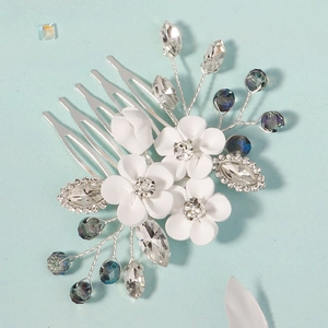 Handmade white flower bridal hair comb with silver five-tooth design and crystals