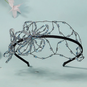 Handmade beaded bridal headband with blue crystals and floral mesh design for women