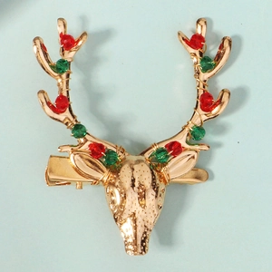 Barrette de Noël en forme de renne doré avec perles de cristal rouges et vertes