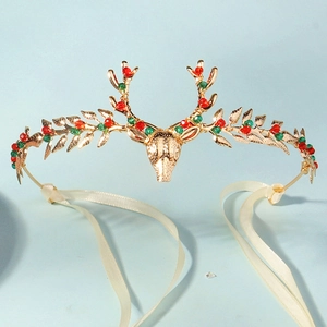 Peigne à cheveux de Noël avec design élan en métal doré et cristaux colorés