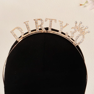 Macro view of gold Dirty 30 rhinestone birthday headband crown with luxury finish