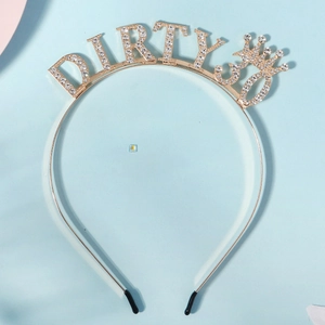 Golden Dirty 30 birthday headband with white rhinestones and a small crown on blue background