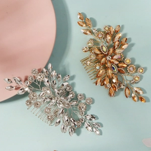 Detailed close-up of handmade rhinestone bridal hair combs in silver and gold flower design