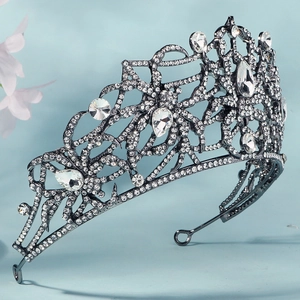 Detailed macro view of vintage baroque tiara with black alloy and sparkling rhinestones