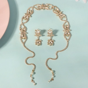 Parure de bijoux de mariée bohème dorée avec bandeau strass et boucles d'oreilles