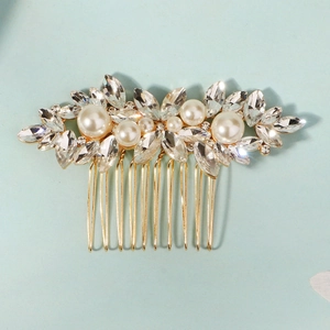 Elegant bridal hair comb with gold metal leaves, white pearls and marquise rhinestones