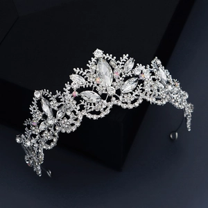 Macro shot of luxurious silver bridal crown with intricate crystals and sparkling marquise gems