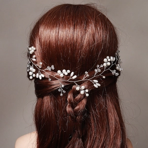 Elegant handmade bridal hair vine with white pearls and crystals on silver wire