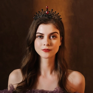 Gothic wedding tiara featuring black alloy crown with red gemstones and dark crystals