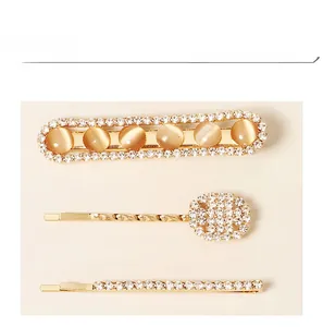 Ensemble de 3 barrettes dorées avec pierres œil-de-chat brunes et strass brillants