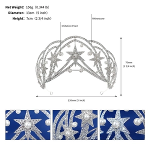Detailed view of silver star crown featuring imitation pearls and sparkling rhinestones