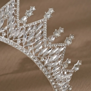 Close-up detail of silver alloy bridal tiara with sparkling crystal rhinestones