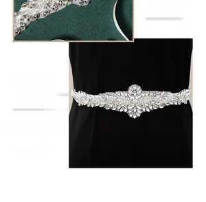 Macro shot of handcrafted marquise crystals and rhinestones on luxury bridal belt