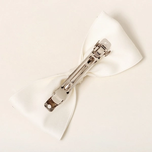 Elegant white satin bow hair clip with polished silver metal spring buckle for women