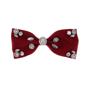 Elegant deep red satin bow hair clip with sparkling crystal rhinestones on white backdrop