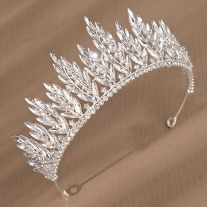 Detailed close-up of wheat ear silver crown with brilliant blue and clear crystals
