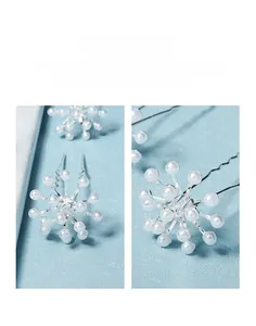 Macro detail of bridal hair pin with silver wire weaving, white pearls and clear crystals