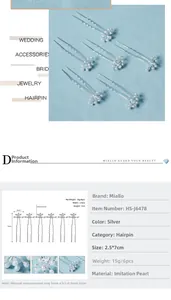 Detail showing set of 6 silver bridal hair pins with white pearls and U-shaped design