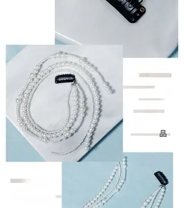 Détail de la chaîne de cheveux multicouche en perles avec clips en U pour mariages