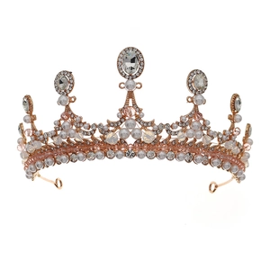 Elegant rose gold baroque bridal crown with white pearls and sparkling crystals