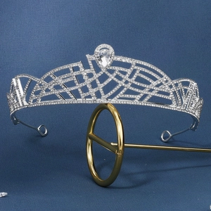 Close-up of a silver alloy bridal tiara with sparkling rhinestones and a teardrop center stone