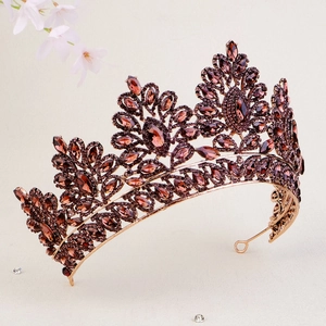 Close-up of vintage bronze bridal crown with amber crystals and teardrop gems