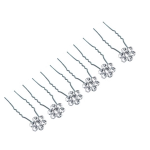 Dettaglio di forcine per capelli a fiore d'argento con strass per acconciature da sposa