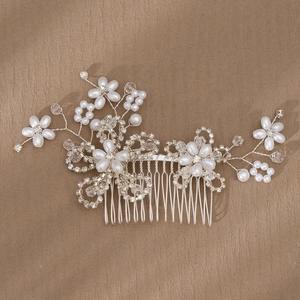 Silver bridal hair comb with handmade pearls and crystal flower petals for wedding styling