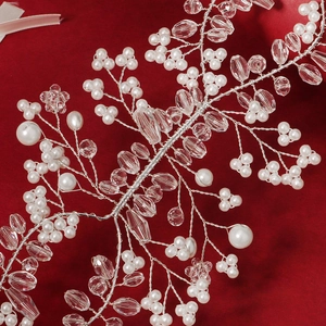 Elegant bridal headband featuring handmade silver wire branches with white pearls and crystals