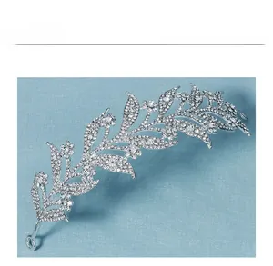 Detailed view of silver bridal hair vine with leaf shapes and sparkling rhinestones