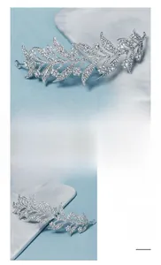 Detailed close-up of handmade bridal headband with crystal leaves and silver alloy finish