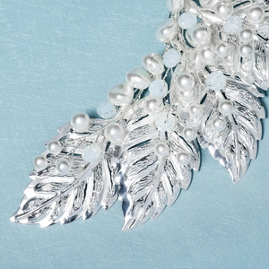 Elegant silver leaf hair clip with white pearls and blue beads for parties