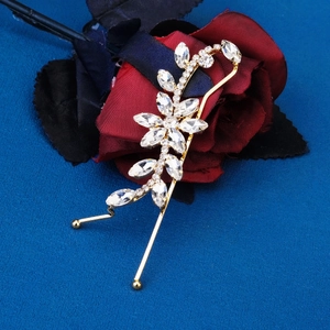 Elegant gold crystal floral hair pin featuring marquise-cut rhinestones for hair styling