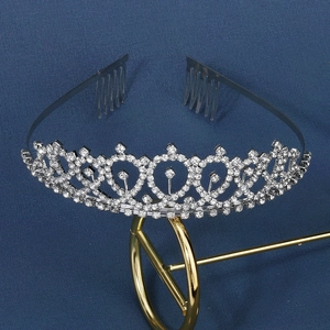 Luxurious silver bridal tiara crown with hollow heart patterns and sparkling rhinestones