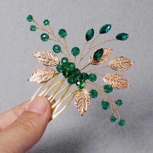 Vintage gold hair comb with green crystals and handmade leaves for bridal hair styling