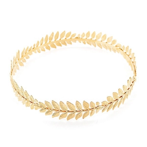 Top-down view of a golden laurel leaf crown with vintage baroque metal leaf textures