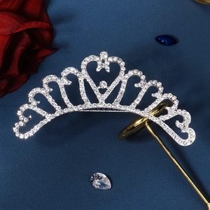 Elegant silver bridal tiara with sparkling rhinestones and heart-shaped patterns