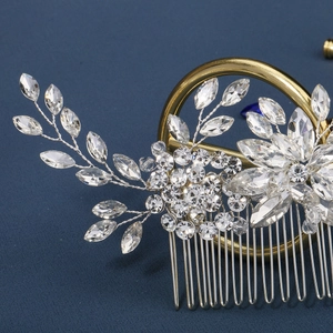 Handmade silver bridal hair comb with marquise rhinestones and leaf motifs for weddings