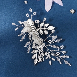 Detailed back view of bridal hair comb showing the metal clip and handcrafted pearl beadwork