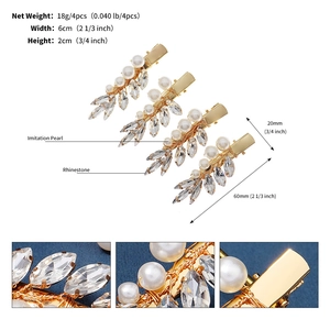 Vue détaillée des pinces à cheveux montrant les dimensions 6x2cm avec perles et strass