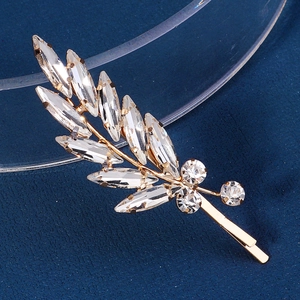 Sparkling rhinestone feather hair clip with gold alloy base and white zircon crystals