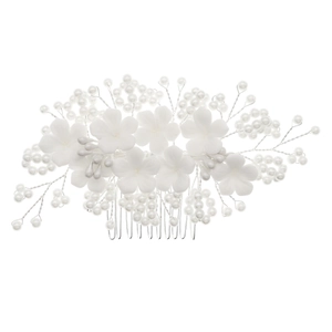 Detail of bridal hair comb featuring matte white resin flowers and silver wire pearls